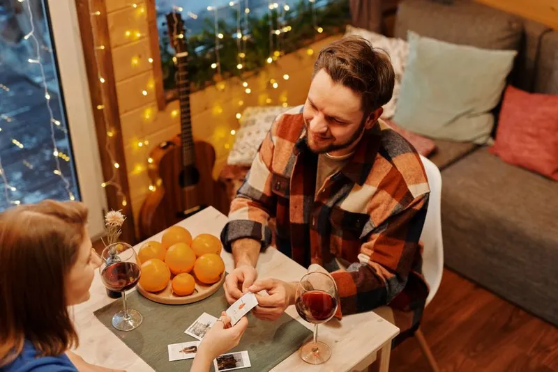 Couple at a table together in warm evening light
