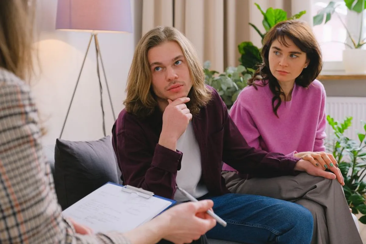 Couple having a calm conversation with a professional