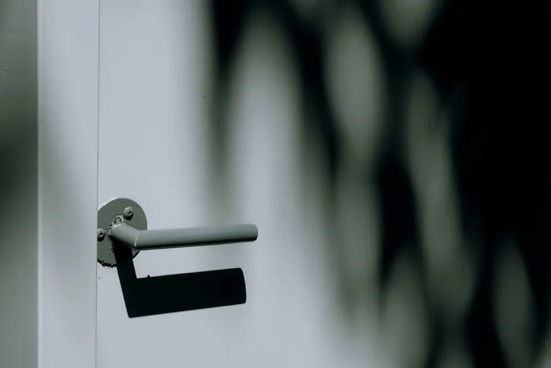 A door handle in a warm home interior