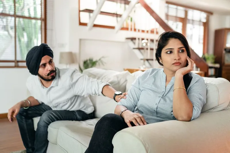 Couple in a serious, honest conversation together at home